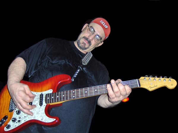 Pat DiNizio photo of The Smithereens guitar player